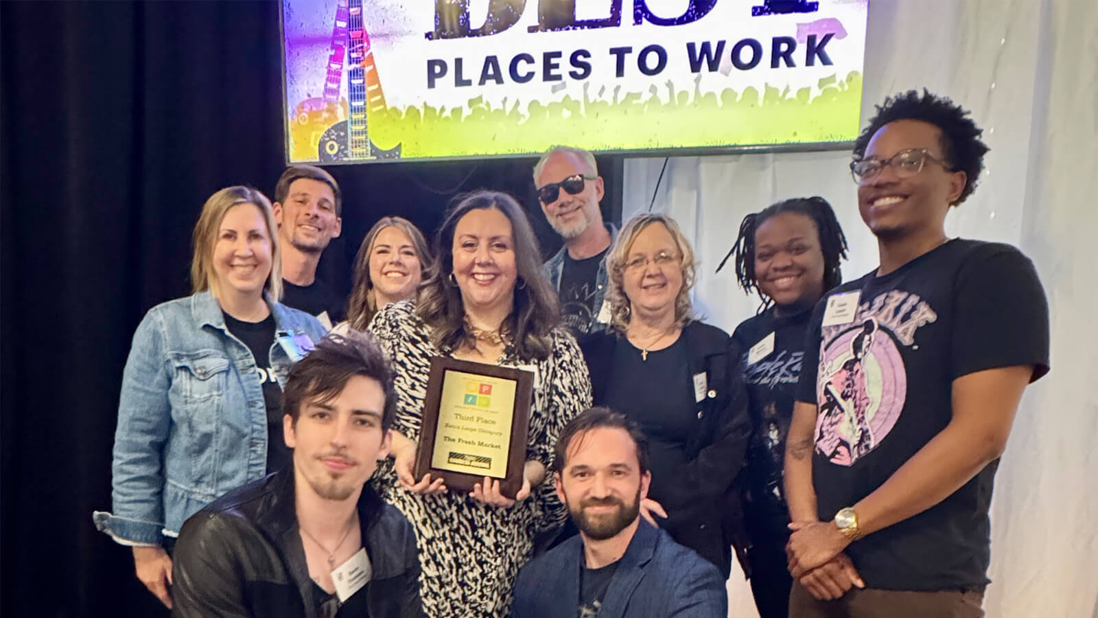 The Fresh Market Employees pose with award.