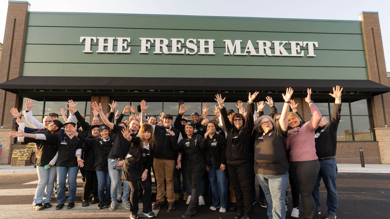 Employees at grand opening of new store in Algonquin, IL.
